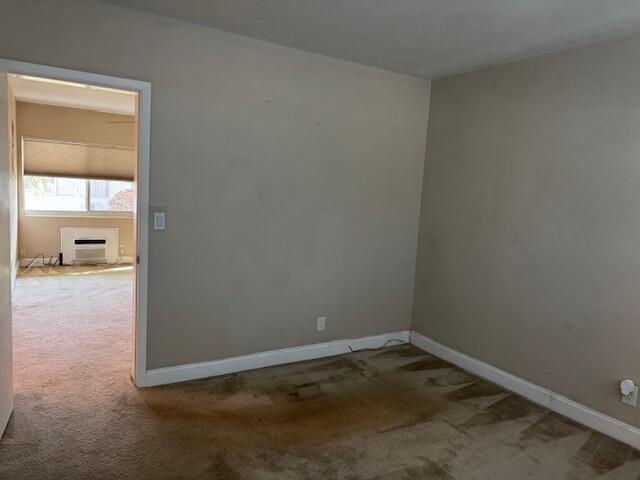 full bath with tile patterned flooring, vanity, toilet, and tile walls