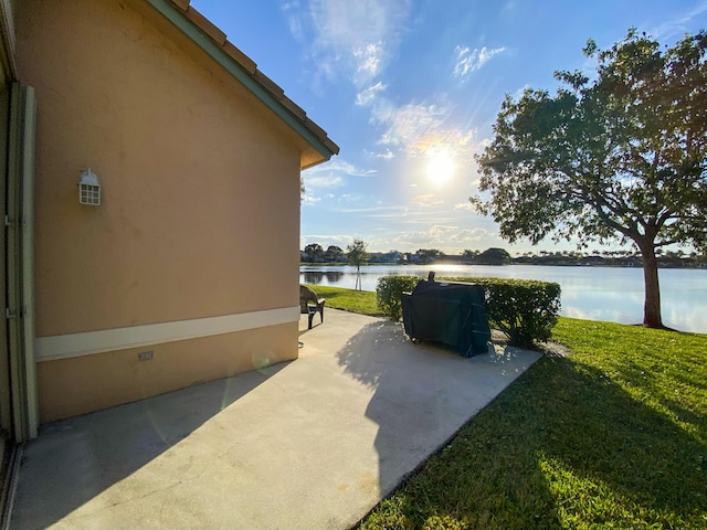 view of patio / terrace featuring a water view