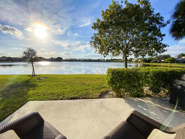 view of patio / terrace featuring a water view