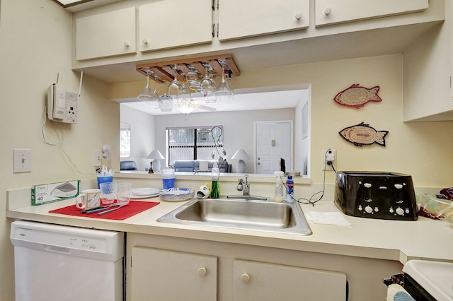 kitchen with dishwasher and sink