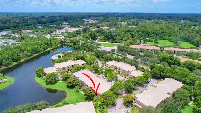 birds eye view of property featuring a water view