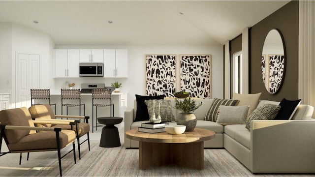 living room featuring vaulted ceiling