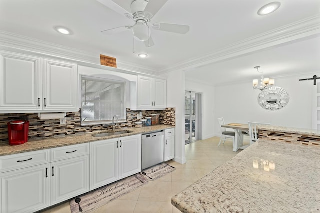 kitchen with white cabinetry, stainless steel dishwasher, ornamental molding, and sink