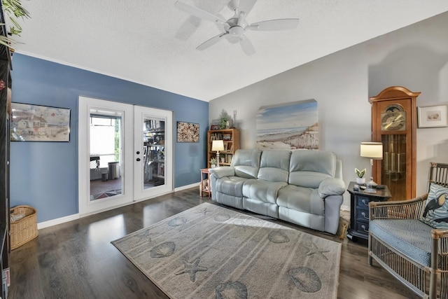 living room with french doors, dark wood-type flooring, lofted ceiling, a textured ceiling, and ceiling fan