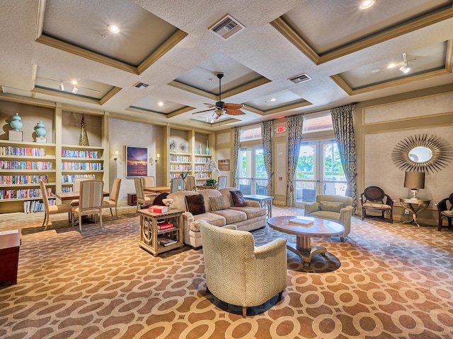 carpeted living room featuring french doors, coffered ceiling, ornamental molding, ceiling fan, and beam ceiling