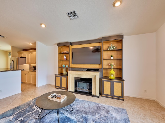 living room with light tile patterned flooring