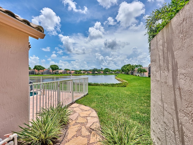 view of yard with a water view