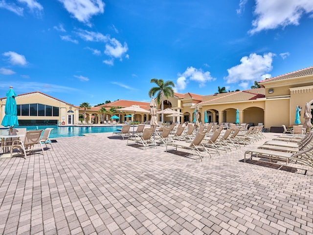 view of swimming pool featuring a patio