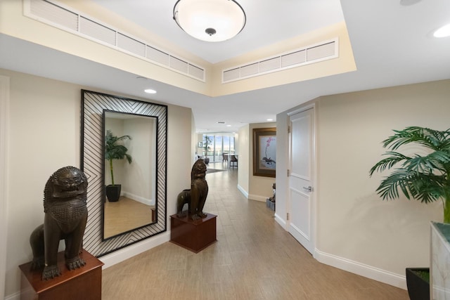 corridor featuring light hardwood / wood-style flooring