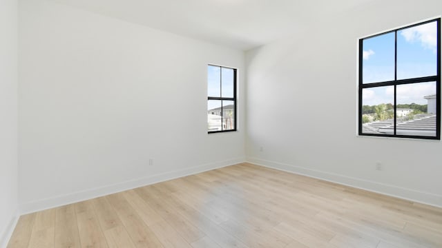 empty room featuring light hardwood / wood-style floors