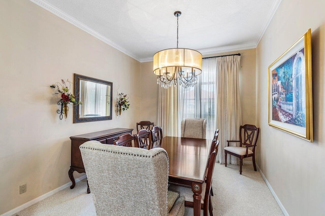 carpeted dining room with crown molding and a notable chandelier