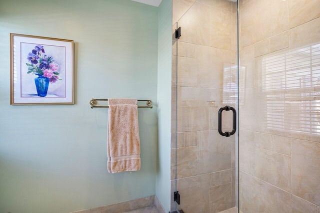 bathroom featuring an enclosed shower