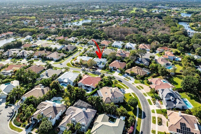 bird's eye view with a water view