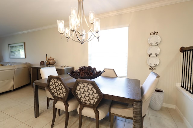 dining room with light tile patterned floors, ornamental molding, and a chandelier