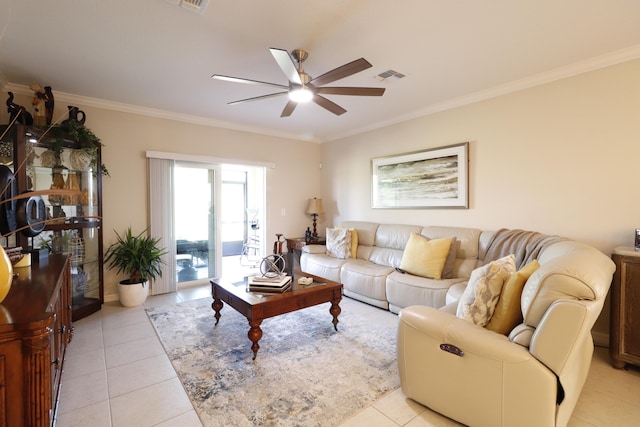 living room featuring crown molding, ceiling fan, and light tile patterned floors