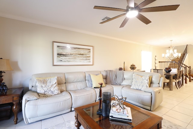 living room featuring crown molding, ceiling fan with notable chandelier, and light tile patterned floors