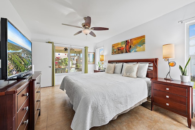 bedroom with ceiling fan, access to exterior, and light tile patterned floors