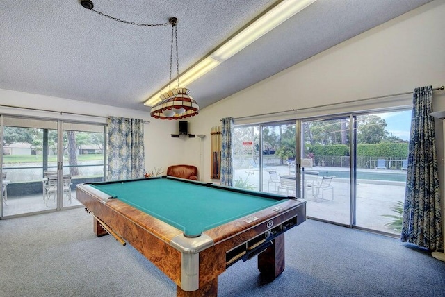 rec room with pool table, vaulted ceiling, carpet, and a wealth of natural light