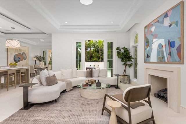 living room featuring a tray ceiling