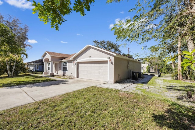 view of front of home featuring a garage and a front lawn