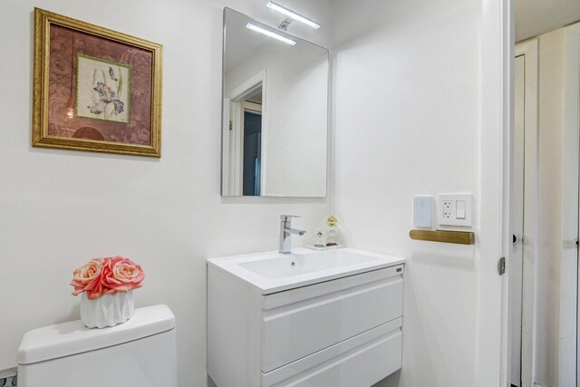 42 Burgundy Unit A, Delray Beach, FL 33484 - bathroom with vanity and toilet