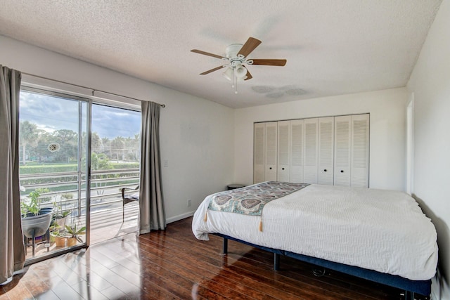 42 Burgundy Unit A, Delray Beach, FL 33484 - bedroom with ceiling fan, access to exterior, dark hardwood / wood-style floors, a textured ceiling, and a closet