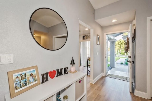 doorway to outside with light hardwood / wood-style floors