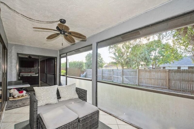 sunroom / solarium with ceiling fan