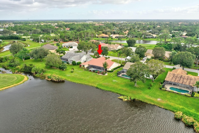 drone / aerial view with a water view