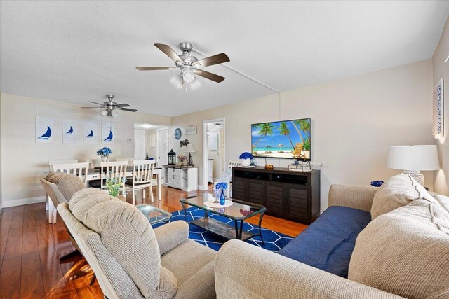 bedroom featuring ceiling fan and hardwood / wood-style floors