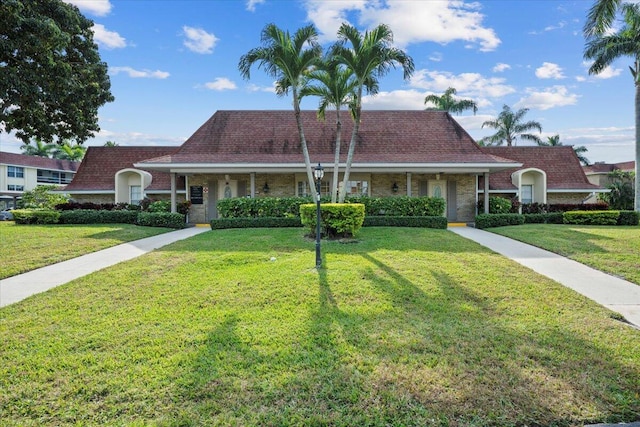 view of front of property with a front lawn