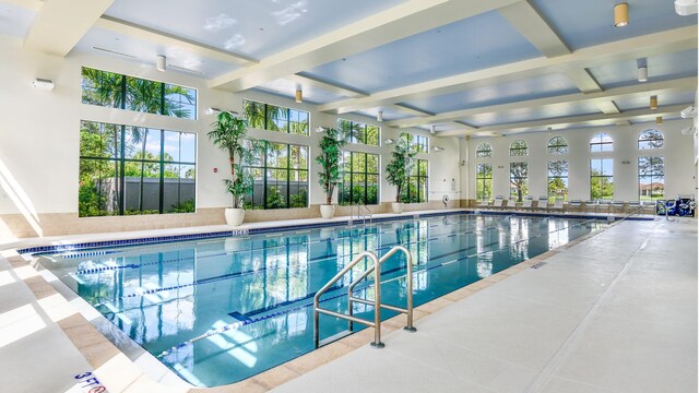 workout area featuring a drop ceiling and carpet flooring