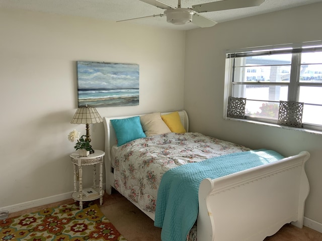 bedroom featuring ceiling fan