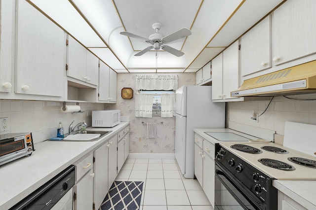 kitchen with sink, white cabinets, light tile patterned floors, ceiling fan, and white appliances