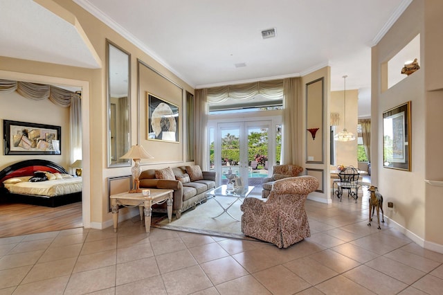 living area featuring ornamental molding, light tile patterned flooring, and french doors