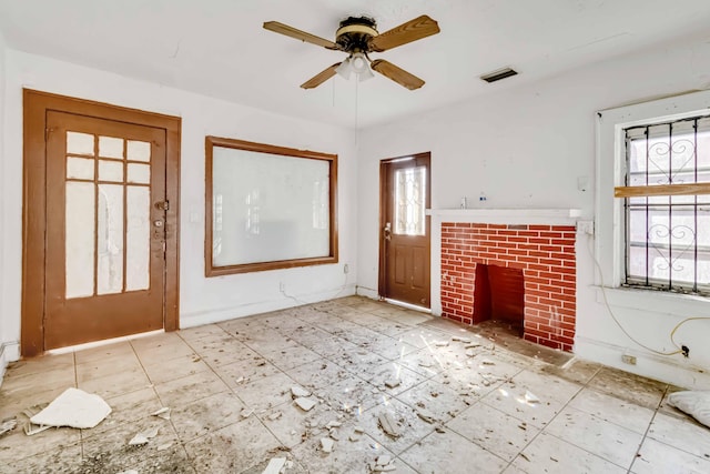 1839 NW 49th St, Miami, FL 33142 - unfurnished living room with a fireplace and ceiling fan