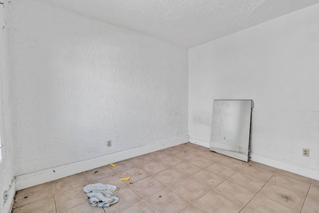 1839 NW 49th St, Miami, FL 33142 - empty room featuring a textured ceiling
