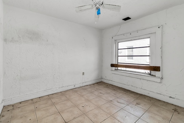 1839 NW 49th St, Miami, FL 33142 - spare room featuring a textured ceiling and ceiling fan