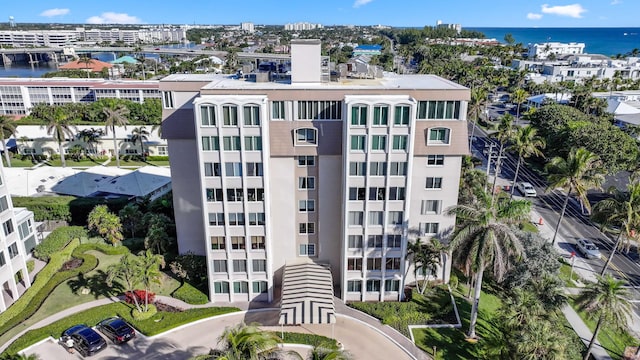 view of building exterior with a water view