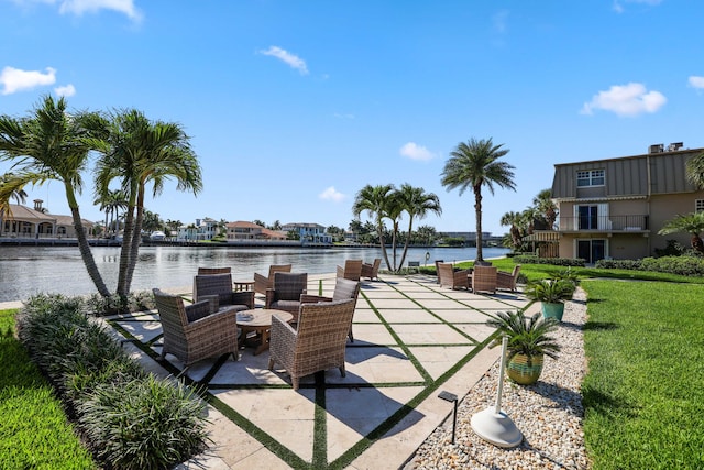 view of patio / terrace with a water view