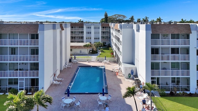 view of pool featuring a patio