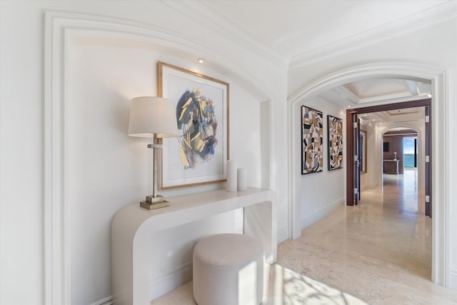 hallway featuring ornamental molding