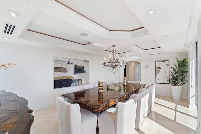 dining space with a tray ceiling, light tile patterned floors, crown molding, and an inviting chandelier