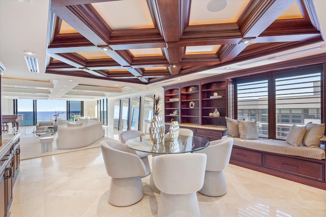 dining area with coffered ceiling, crown molding, expansive windows, and a water view