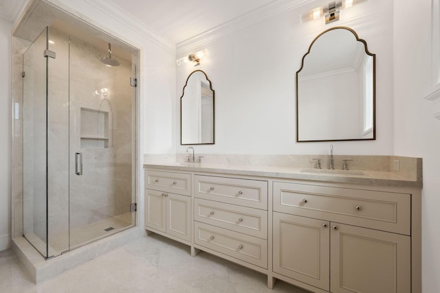 bathroom with double vanity, ornamental molding, a sink, and a shower stall