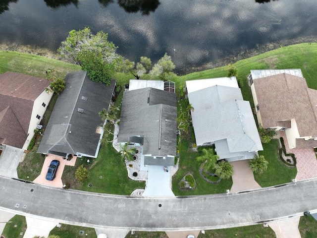 drone / aerial view featuring a water view