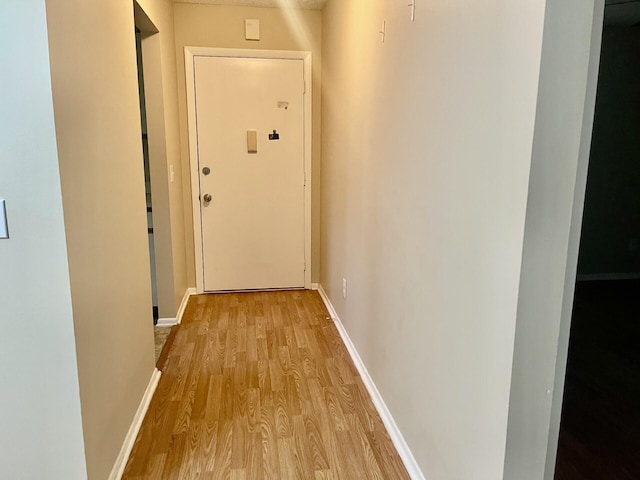 15 Lake Vista Trl Unit 206, Port Saint Lucie, FL 34952 - corridor featuring light wood-style flooring and baseboards