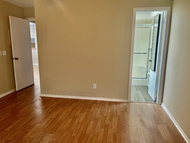 15 Lake Vista Trl Unit 206, Port Saint Lucie, FL 34952 - spare room with wood finished floors and baseboards
