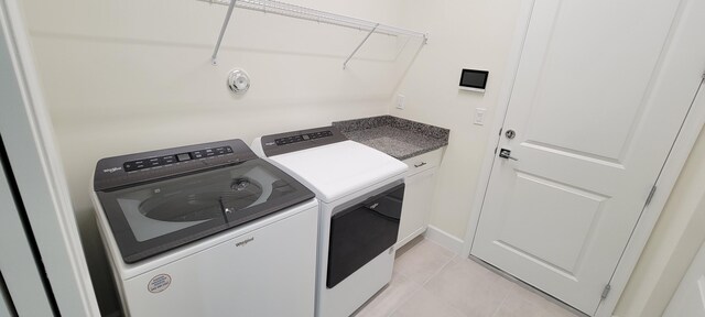 bathroom with tile patterned flooring and toilet