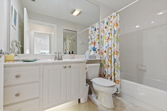 full bathroom featuring vanity, toilet, and shower / tub combo